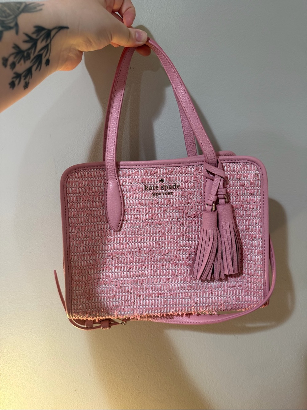 kate spade pink woven tote with tassel charm
